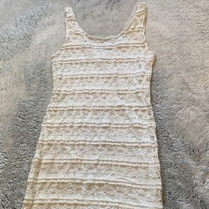 White/Cream stretchy fitting dress.